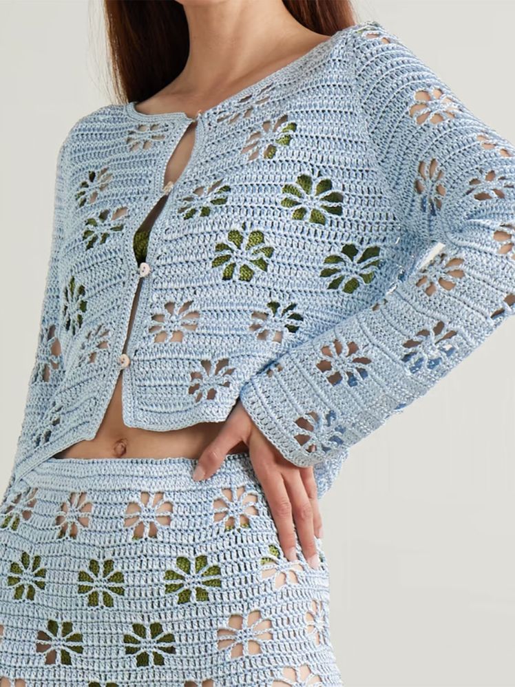 Image may contain Clothing Knitwear Sweater and Blouse