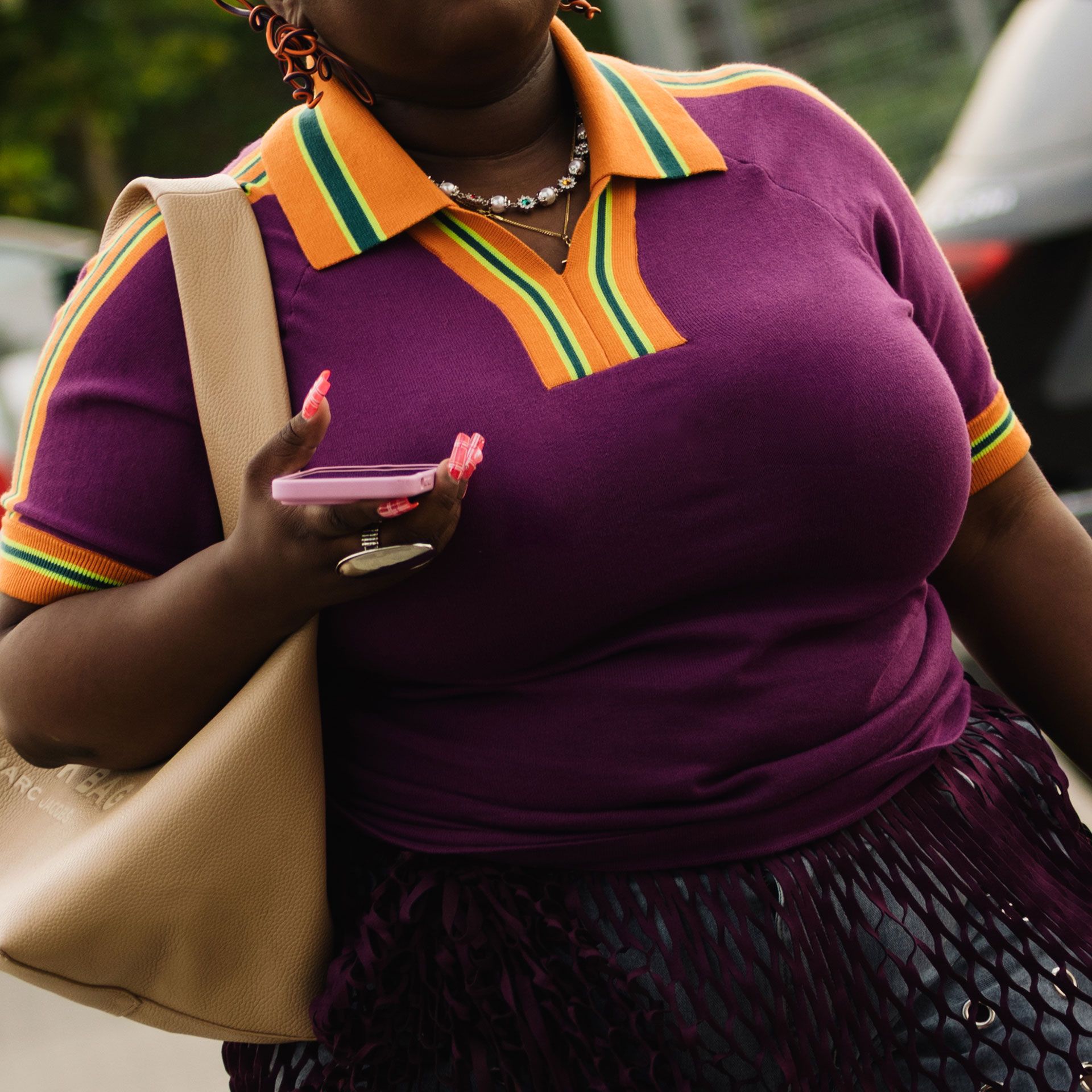 Image may contain Blouse Clothing Adult Person Purple Accessories Jewelry Necklace Electronics and Phone disgustingly...