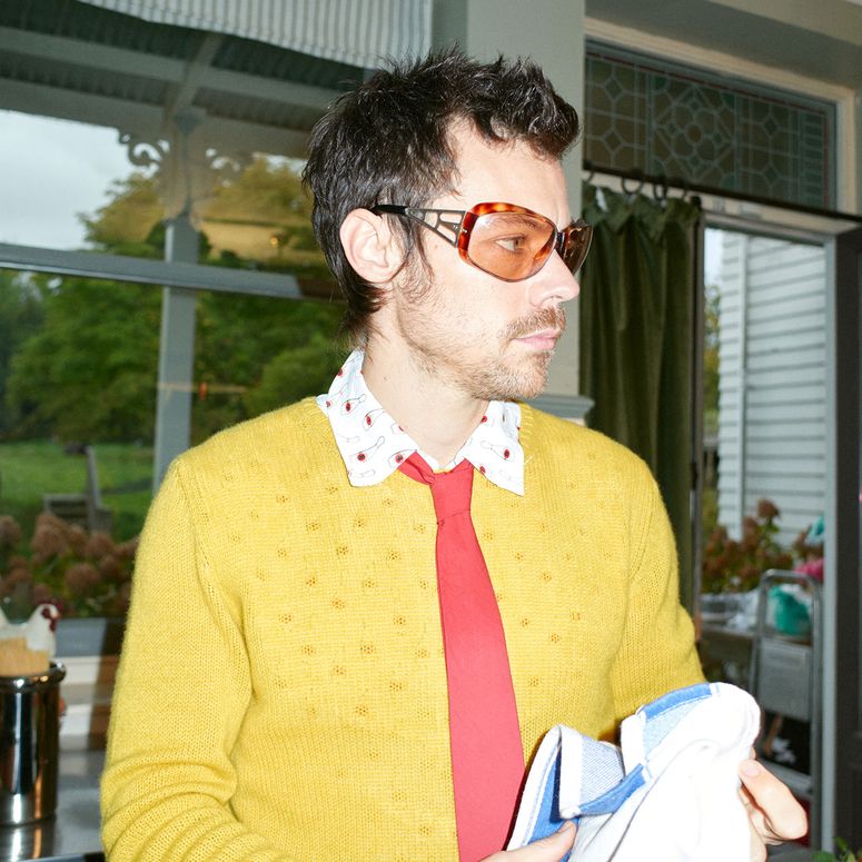 Image may contain: Harry Styles, Accessories, Glasses, Formal Wear, Tie, Face, Head, Person, Photography, and Portrait