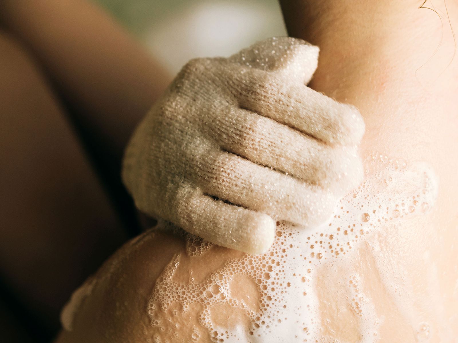 How to use exfoliating gloves properly, according to skin experts