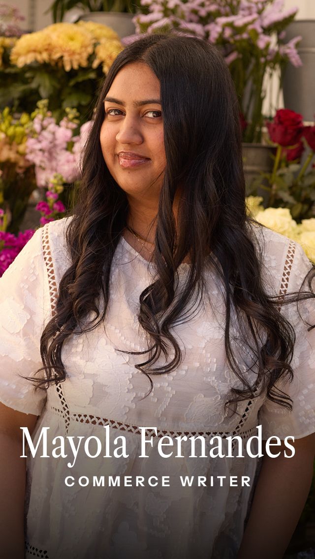 Image may contain Face Head Person Photography Portrait Adult Flower Flower Arrangement Plant and Accessories