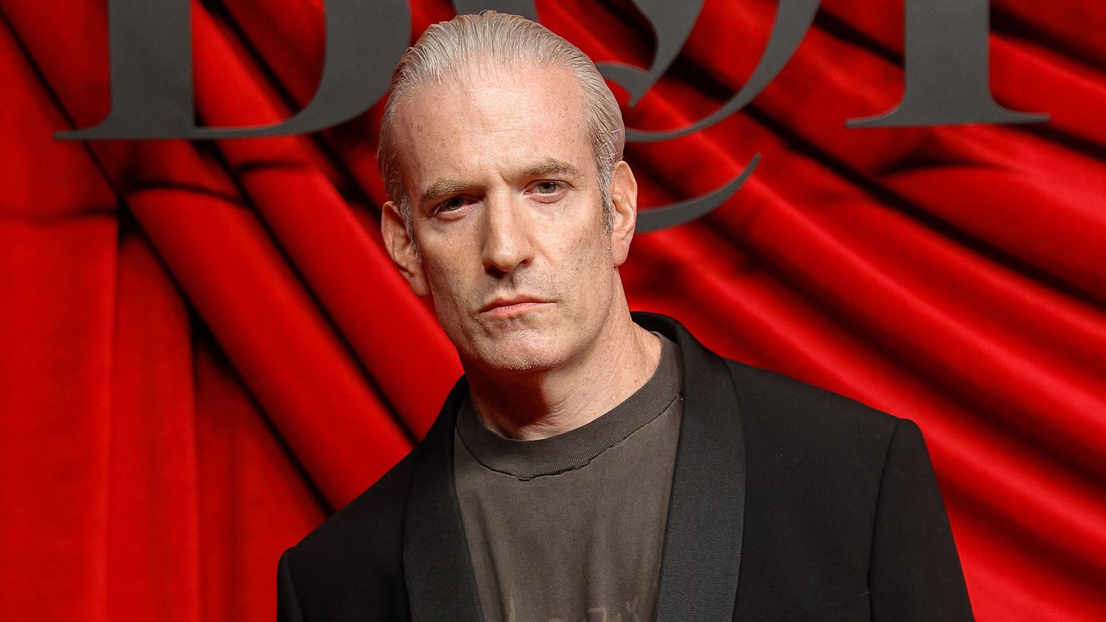 Image may contain Blonde Hair Person Fashion Adult Head Body Part Face Neck Photography and Portrait